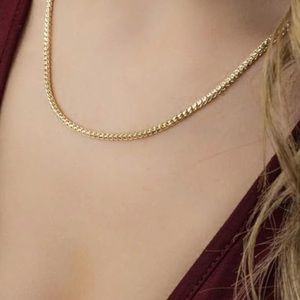 Gold Cuban Chain 
4mm wide, 18 inches long - Unisex